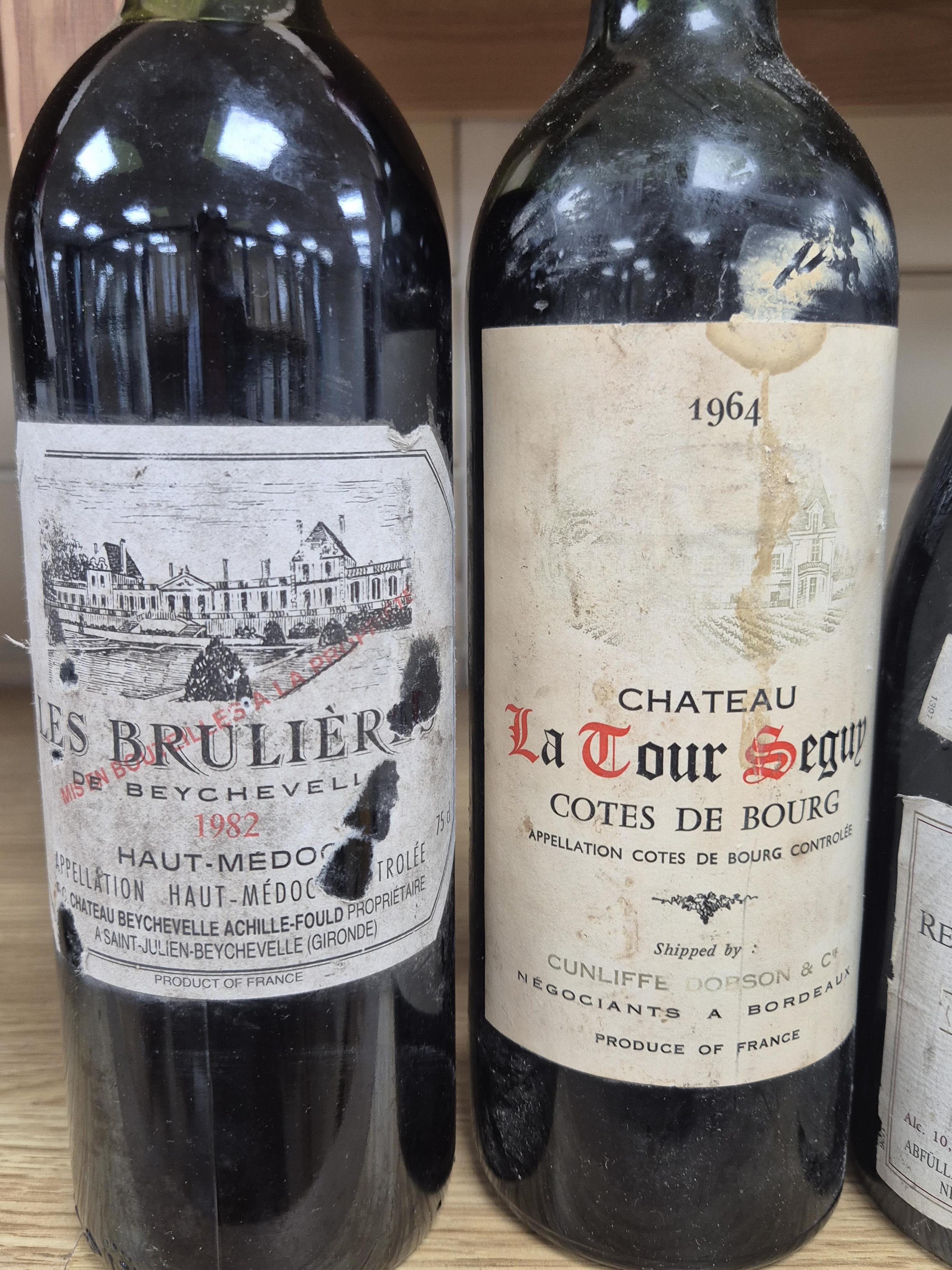Four bottles of red wine; Chateau La Tour Seguy, 1964, Les Brulier Haut-Medoc, 1982, Chateau Grand-Puy Lacoste, 1970, and Recas Dealul Vechi Rekascher Altberg Cabinet Vollreiflese CMD, 1985